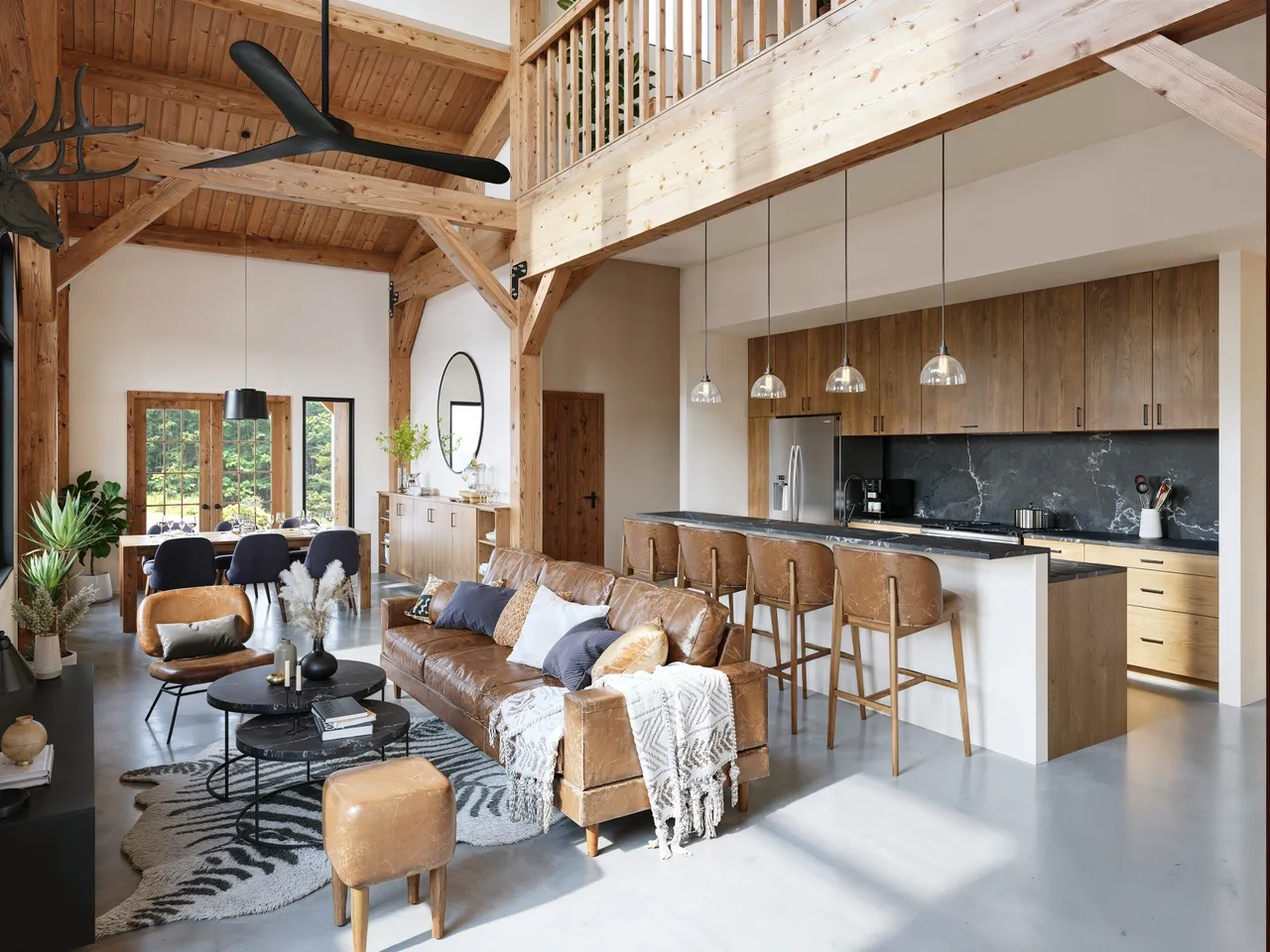3D interior rendering of an open-plan timber-frame living room and kitchen with a vaulted wood-beam ceiling, a loft mezzanine, a brown leather sofa, a kitchen island with leather stools and pendant lights, and polished concrete floors