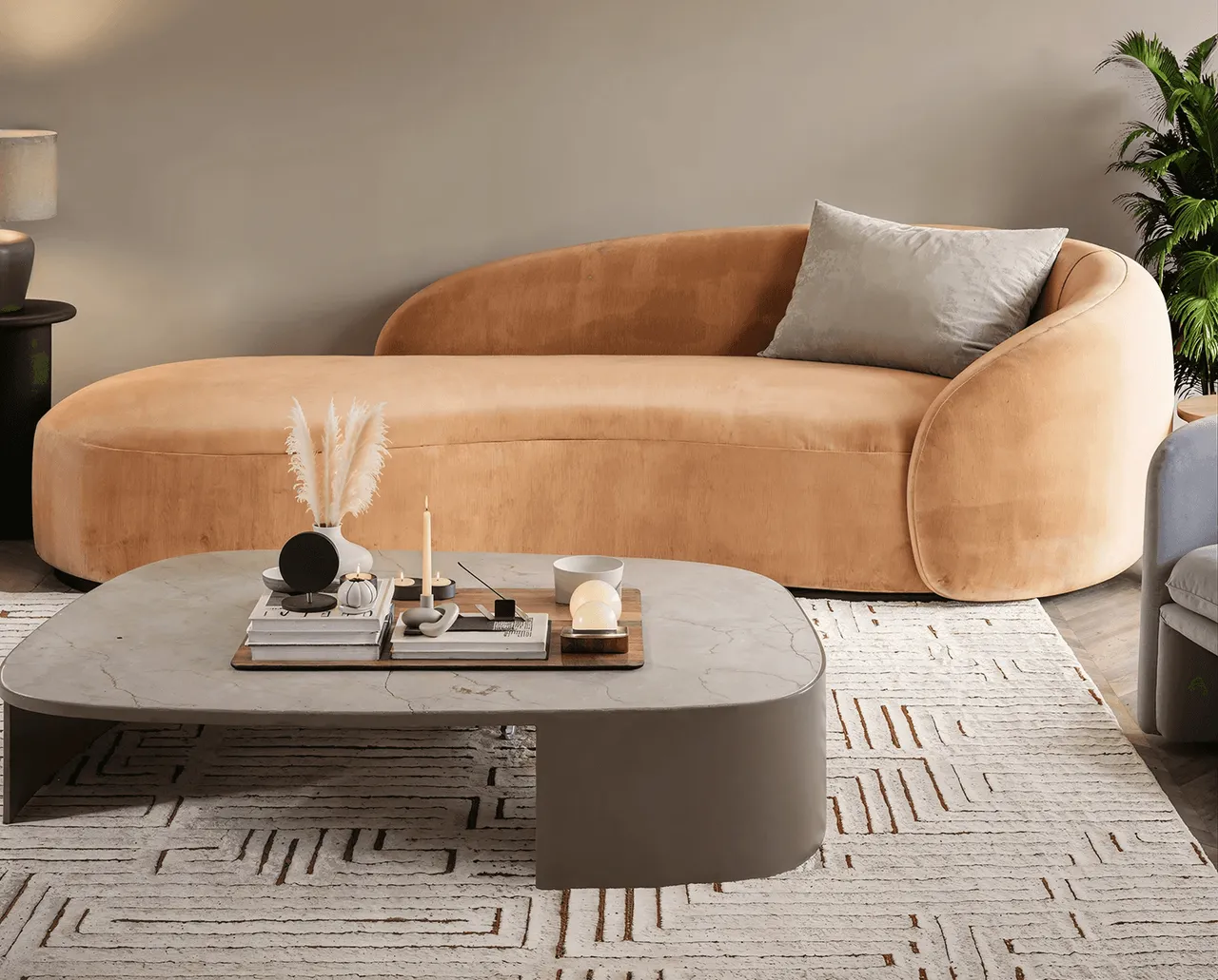 3D interior render of a styled living room with a curved camel sofa and oval coffee table