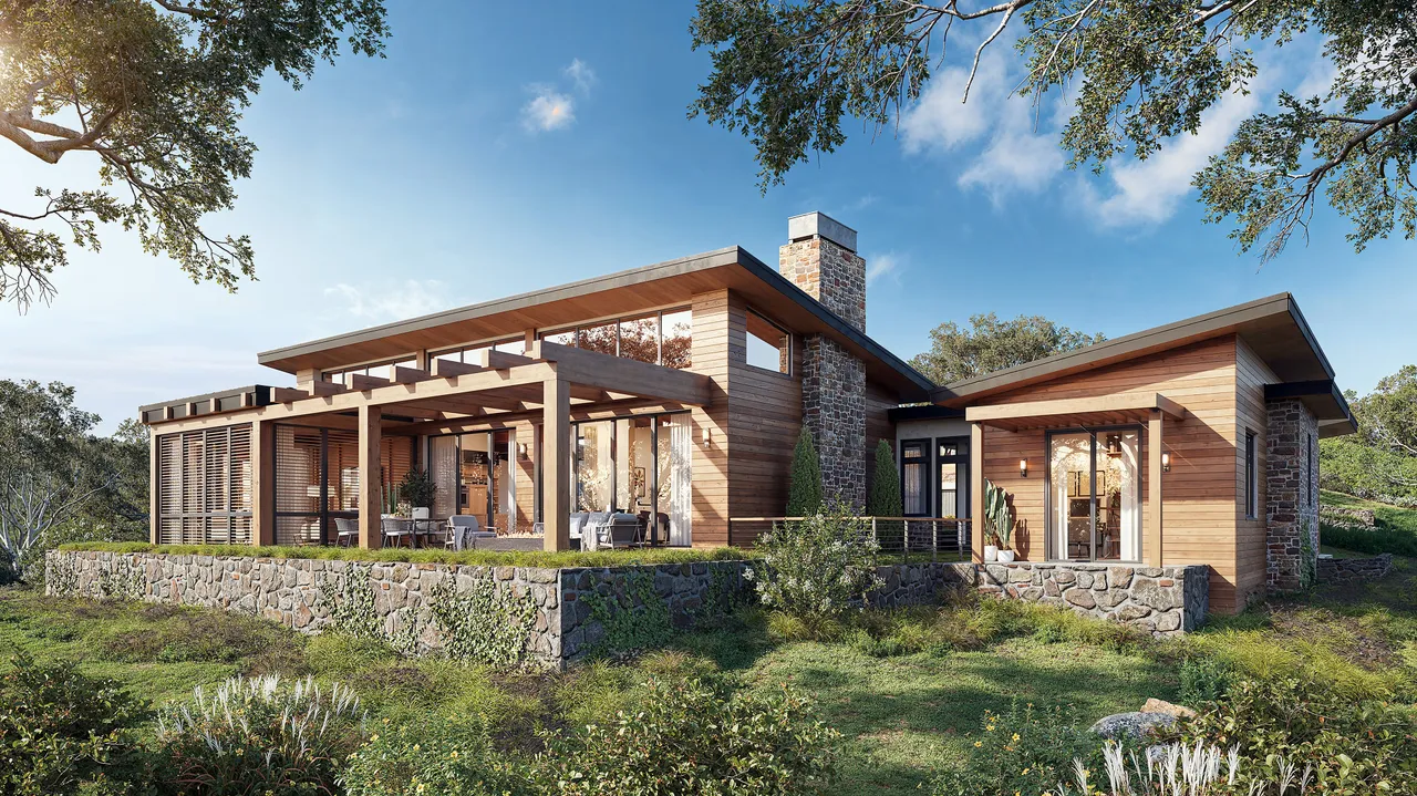 Exterior 3D rendering of a modern cabin-style home featuring natural wood siding, large floor-to-ceiling windows, a stone chimney, and a spacious covered patio. The house sits on a stone foundation surrounded by lush landscaping and trees under a clear blue sky.
