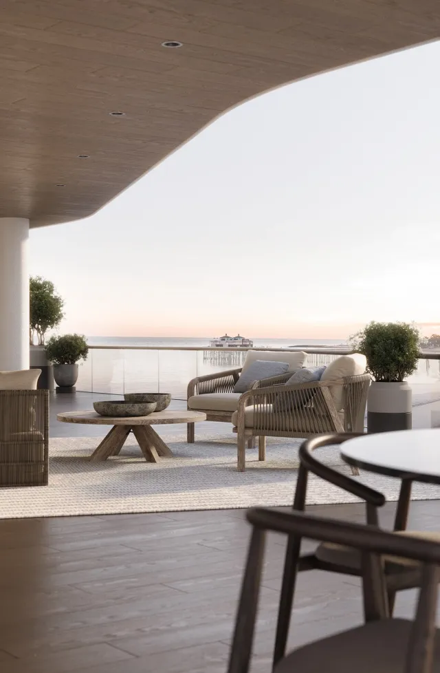 High‑quality 3D rendering of a modern outdoor balcony lounge overlooking a waterfront, featuring designer seating and teak decking at sunset